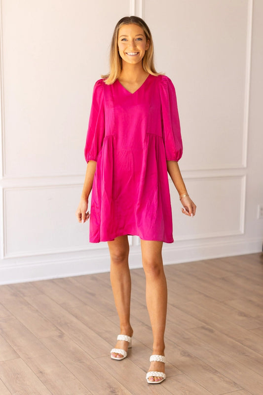 Hot Pink Satin Babydoll Dress is the perfect combination of elegance and playful charm. Featuring a shiny satin finish, this dress boasts a flattering babydoll silhouette.