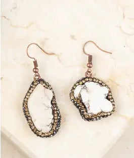 Pair of earrings with a natural stone design on a light background
