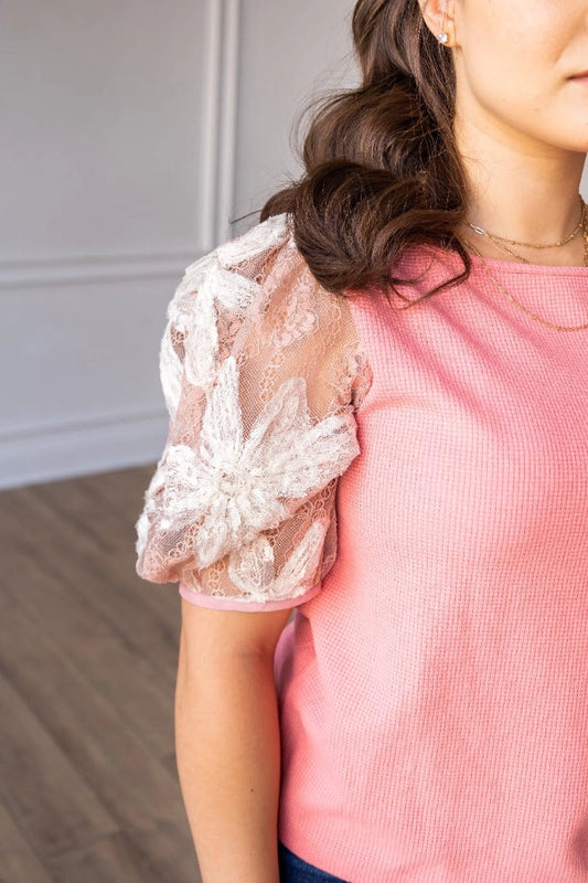 Pink Lace Puff Sleeve Top is a perfect combination of elegance and simplicity. Featuring delicate sheer lace puff sleeves and a classic boat neckline.
