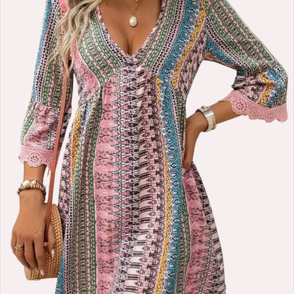 Pink Boho Lace Trim Mini Dress is a vibrant and breezy piece that captures effortless bohemian charm. Featuring a deep V-neckline and 3/4-length bell sleeves.