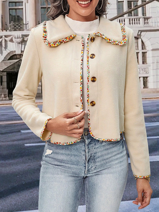  Buttoned Lapel Jacket is a stylish and versatile piece designed for a polished yet relaxed look. this jacket features a loose fit and long sleeves for effortless comfort. 