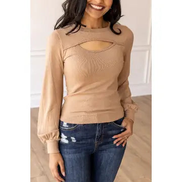Tan Cutout High-Neck Top is a trendy and sophisticated piece that combines modern design with a flattering fit. Featuring a high neckline.