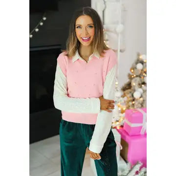  Embellished Vest is a stylish and feminine addition to your wardrobe. Featuring a soft pink hue with delicate embellishments.