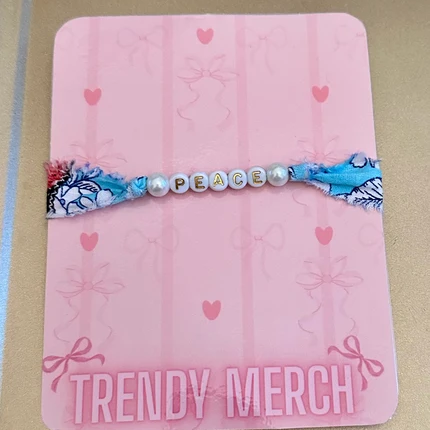 Peace Floral Fabric Word Bracelet on Trendy Merch display card