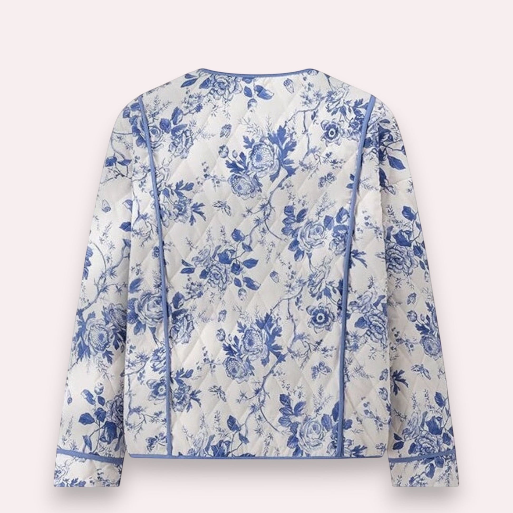 Trendy Merch blue and white floral quilted jacket with piping detail, polyester-cotton blend.