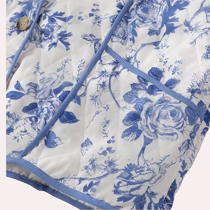 Trendy Merch blue and white floral quilted jacket with piping detail and button front. 80% Polyester, 20% Cotton.