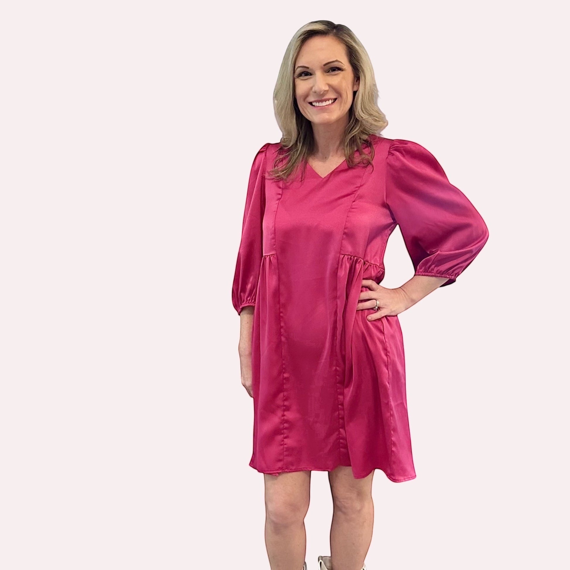 Trendy Merch Rory satin babydoll dress in fuchsia with V-neckline and puffed three-quarter sleeves.